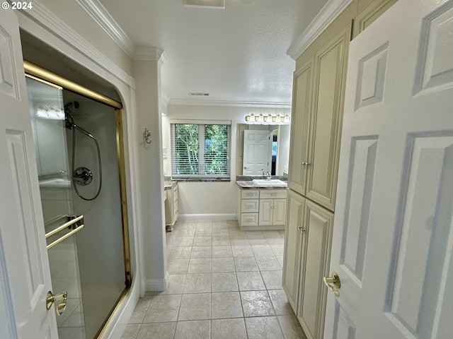 98694 Woodriff Ln, Brookings, OR 97415 - full bath featuring a stall shower, tile patterned floors, visible vents, vanity, and ornamental molding