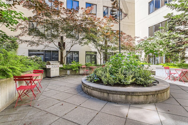 1420 NW Lovejoy St Unit 327, Portland, OR 97209 - surrounding community with a patio