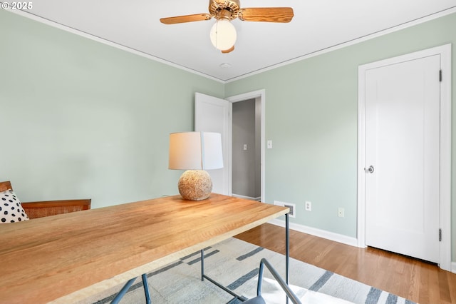 6611 SE 40th Ave, Portland, OR 97202 - office area with wood finished floors, ornamental molding, and a ceiling fan
