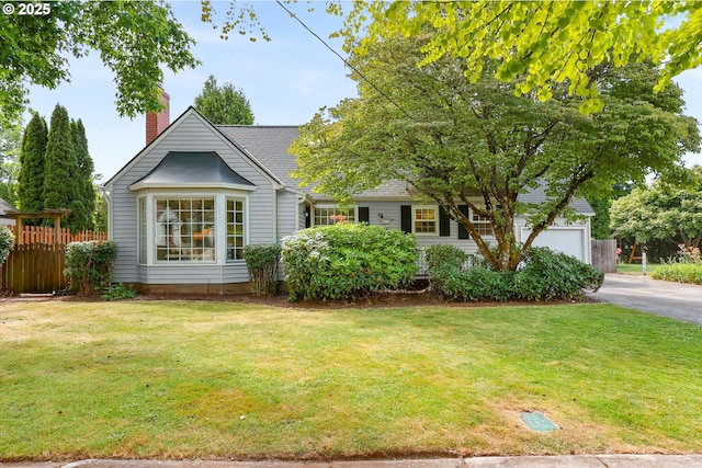 6611 SE 40th Ave, Portland, OR 97202 - view of front of property with driveway, a chimney, and an attached garage
