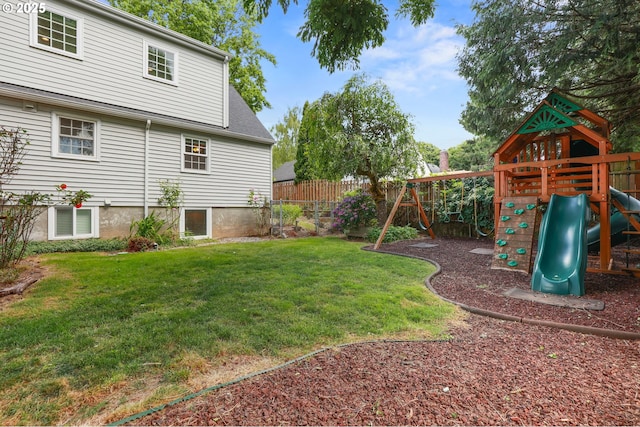 6611 SE 40th Ave, Portland, OR 97202 - fenced backyard featuring a playground