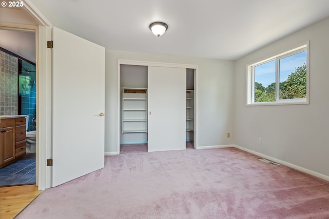 6120 SW Cross Creek Dr, Beaverton, OR 97078 - unfurnished bedroom with a closet, carpet, and ensuite bath