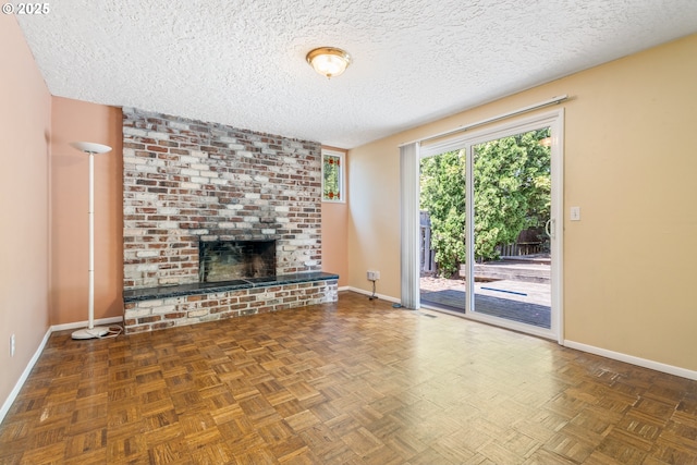 6120 SW Cross Creek Dr, Beaverton, OR 97078 - unfurnished living room with a textured ceiling and a brick fireplace