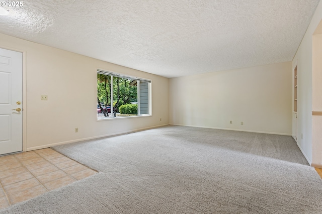 6120 SW Cross Creek Dr, Beaverton, OR 97078 - spare room with carpet and a textured ceiling