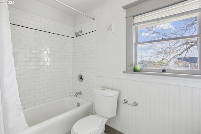 5025 NE 6th Ave, Portland, OR 97211 - full bath featuring shower / tub combo, wainscoting, and toilet