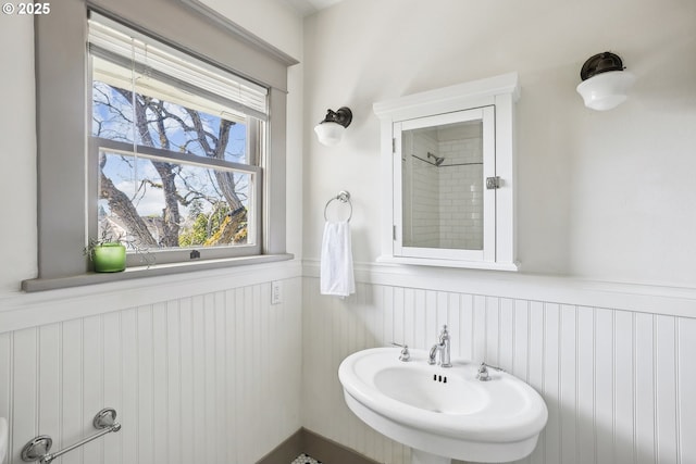 5025 NE 6th Ave, Portland, OR 97211 - full bathroom featuring a wainscoted wall and a sink