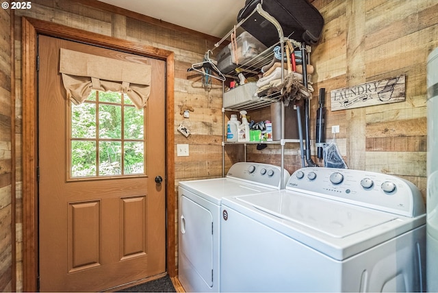 241 Jackson Rd, Cook, WA 98605 - laundry room with washing machine and dryer and wooden walls