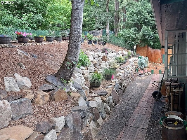 view of yard featuring fence