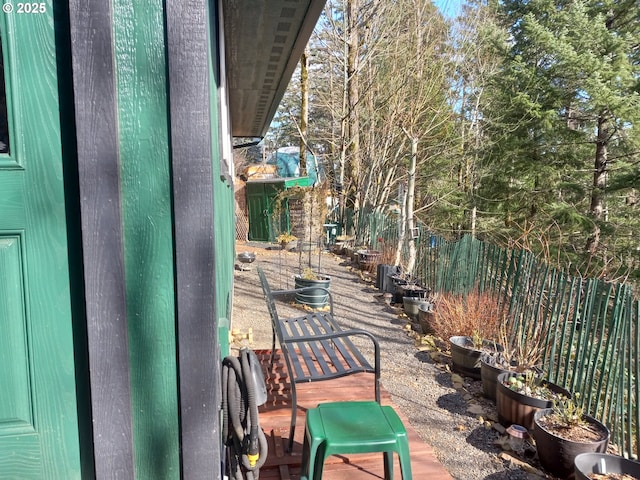 view of patio / terrace featuring fence