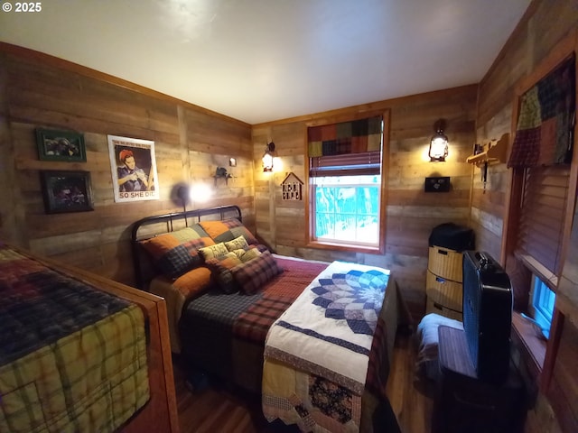 bedroom with wooden walls