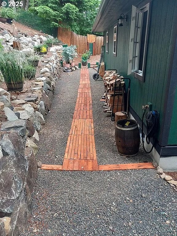 view of patio featuring fence