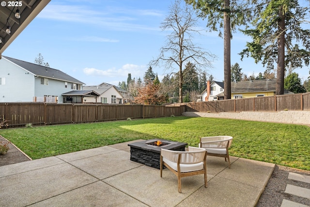 view of patio / terrace with an outdoor fire pit