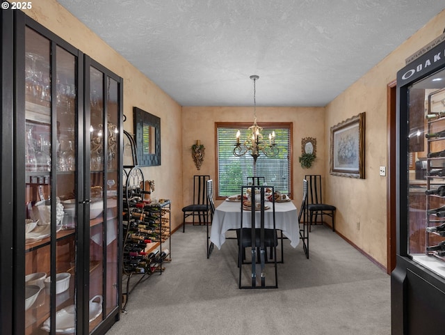 67 NW Orchard Pl, Gresham, OR 97030 - carpeted dining room featuring a chandelier, a textured ceiling, and baseboards