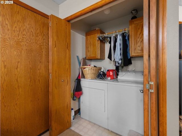 67 NW Orchard Pl, Gresham, OR 97030 - laundry room featuring washer and dryer, cabinet space, and light flooring