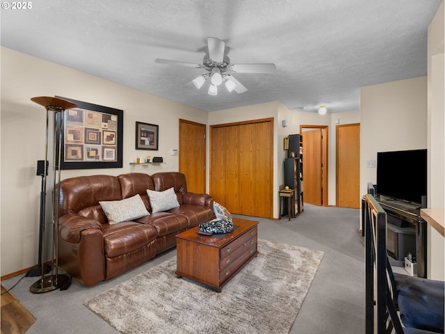 67 NW Orchard Pl, Gresham, OR 97030 - living area featuring ceiling fan, a textured ceiling, and carpet floors