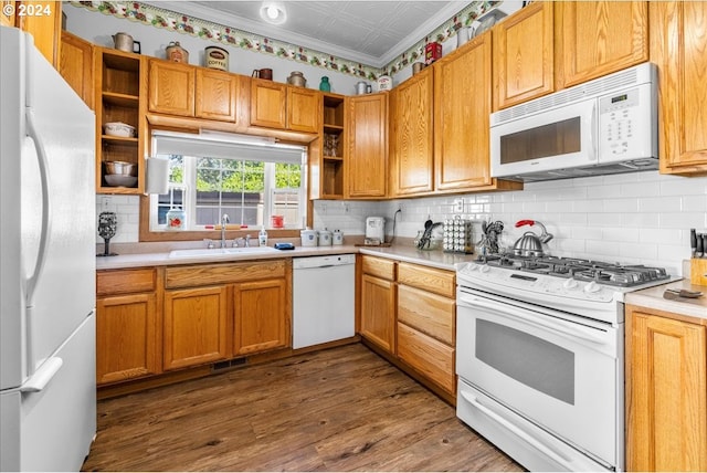 kitchen with an ornate ceiling, open shelves, light countertops, a sink, and white appliances