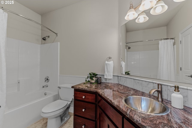 335 Runyan Rd, Woodland, WA 98674 - bathroom featuring a wainscoted wall, vanity, shower / bath combination with curtain, toilet, and decorative backsplash