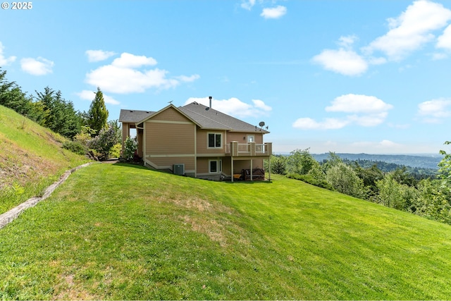 335 Runyan Rd, Woodland, WA 98674 - back of house with a yard and a wooden deck
