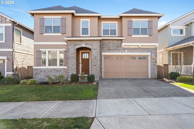 view of front of house featuring a garage and a front yard