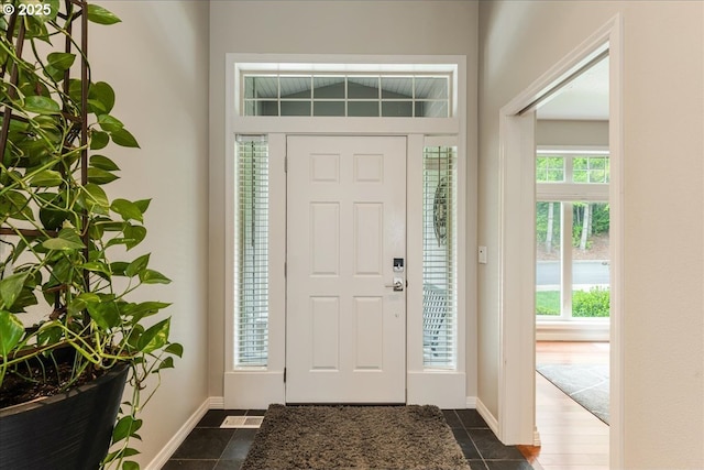 626 SE 38th Dr, Gresham, OR 97080 - foyer entrance featuring baseboards and dark tile patterned floors