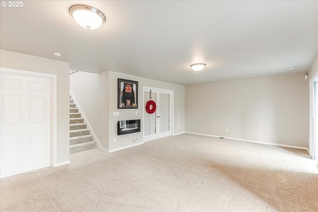 626 SE 38th Dr, Gresham, OR 97080 - unfurnished living room with carpet floors, heating unit, and stairs