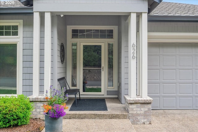 626 SE 38th Dr, Gresham, OR 97080 - view of exterior entry featuring a porch and a garage
