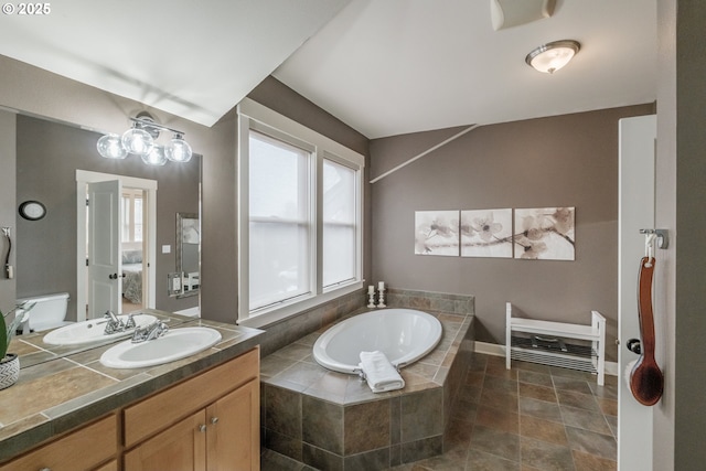 full bath featuring a bath and vanity