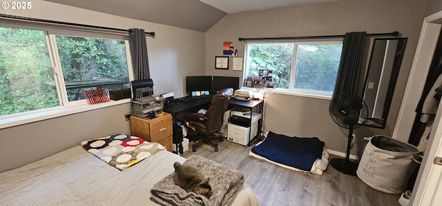 94191 Seaview Ln, Gold Beach, OR 97444 - office area featuring wood finished floors, vaulted ceiling, and baseboards