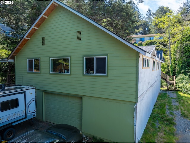 94191 Seaview Ln, Gold Beach, OR 97444 - view of side of home with a garage