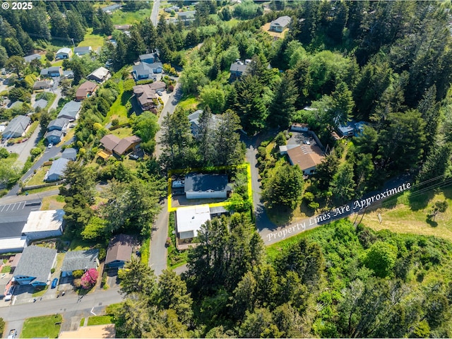 94191 Seaview Ln, Gold Beach, OR 97444 - aerial overview of property's location featuring nearby suburban area and property parcel outlined
