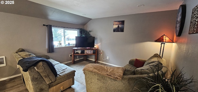 94191 Seaview Ln, Gold Beach, OR 97444 - living room featuring baseboards, vaulted ceiling, and wood finished floors