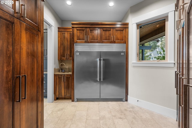 5390 NW Roanoke Ln, Portland, OR 97229 - kitchen with stainless steel built in fridge and recessed lighting
