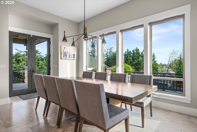 5390 NW Roanoke Ln, Portland, OR 97229 - dining room featuring plenty of natural light and french doors
