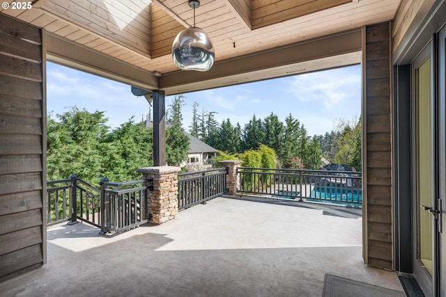5390 NW Roanoke Ln, Portland, OR 97229 - view of patio / terrace featuring view of wooded area