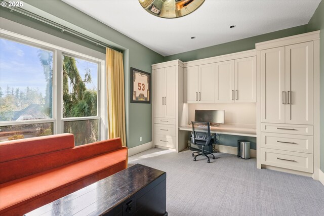 5390 NW Roanoke Ln, Portland, OR 97229 - home office with light carpet and built in desk