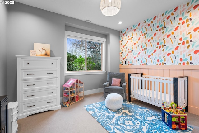 5390 NW Roanoke Ln, Portland, OR 97229 - bedroom with a nursery area, carpet floors, and recessed lighting