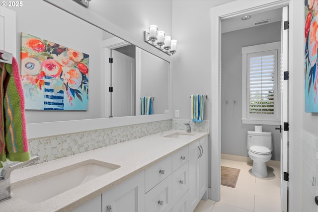 5390 NW Roanoke Ln, Portland, OR 97229 - bathroom featuring double vanity and tile patterned flooring