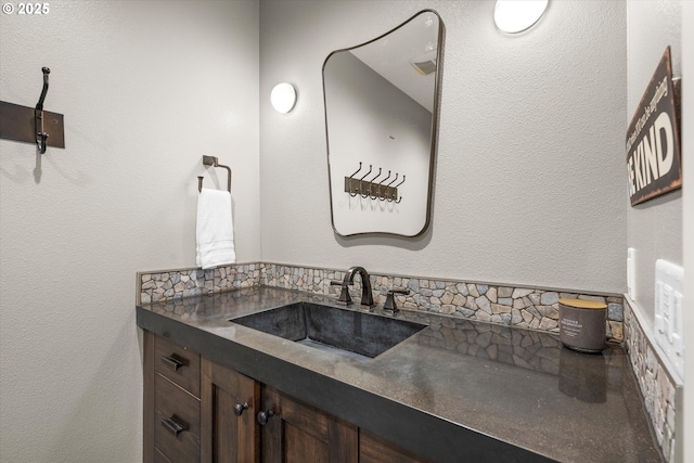 5390 NW Roanoke Ln, Portland, OR 97229 - bathroom featuring vanity and backsplash