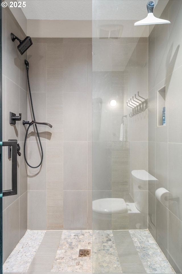 5390 NW Roanoke Ln, Portland, OR 97229 - full bathroom with tile walls and tiled shower