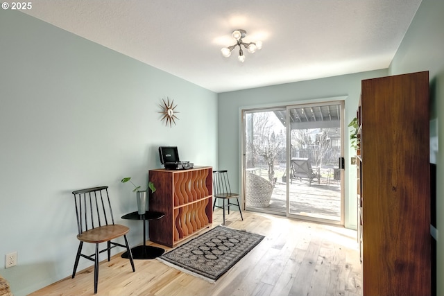 living area with wood finished floors