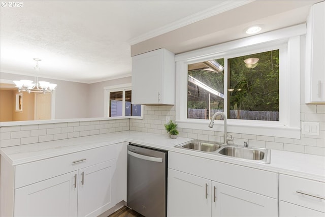 108 Lomor Dr, Longview, WA 98632 - kitchen with stainless steel dishwasher, a sink, a peninsula, light countertops, and ornamental molding