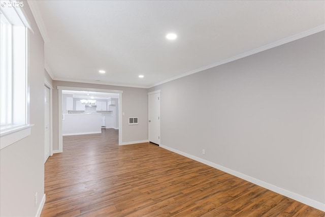 108 Lomor Dr, Longview, WA 98632 - unfurnished room featuring crown molding, a chandelier, wood finished floors, recessed lighting, and baseboards