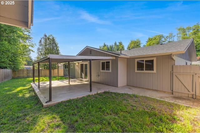 108 Lomor Dr, Longview, WA 98632 - back of property featuring a patio area and roof with shingles