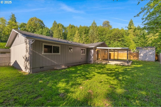 108 Lomor Dr, Longview, WA 98632 - rear view of house featuring a patio area and board and batten siding