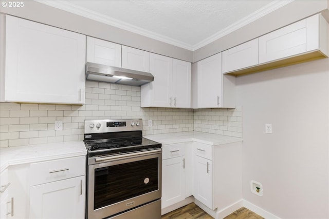 108 Lomor Dr, Longview, WA 98632 - kitchen featuring stainless steel range with electric stovetop, extractor fan, light wood-style flooring, white cabinetry, and crown molding