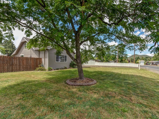 view of yard with fence