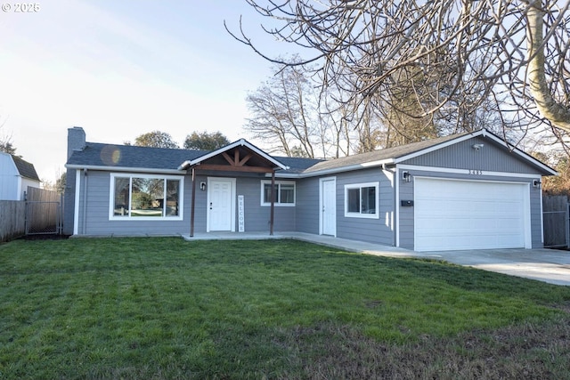 ranch-style house with a front yard and a garage