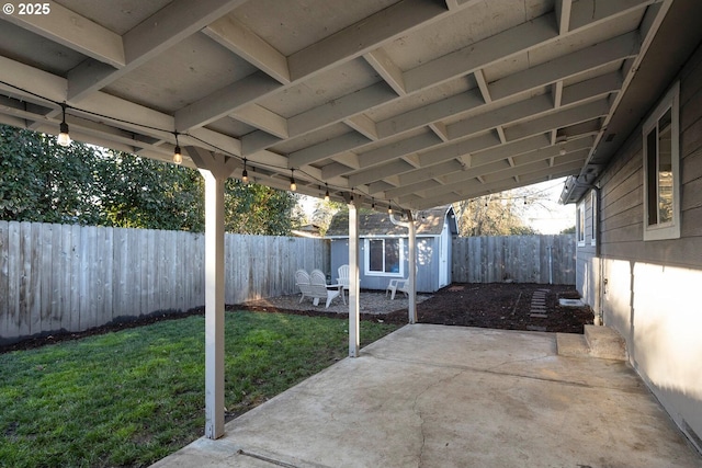 view of patio / terrace with an outbuilding