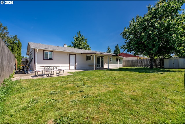 4738 NE Royal Oak Ct, Salem, OR 97301 - rear view of house featuring a patio area and a chimney