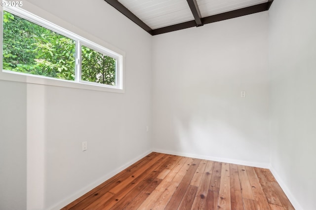 28831 SE Woods Rd, Eagle Creek, OR 97022 - unfurnished room featuring beamed ceiling, hardwood / wood-style floors, and baseboards